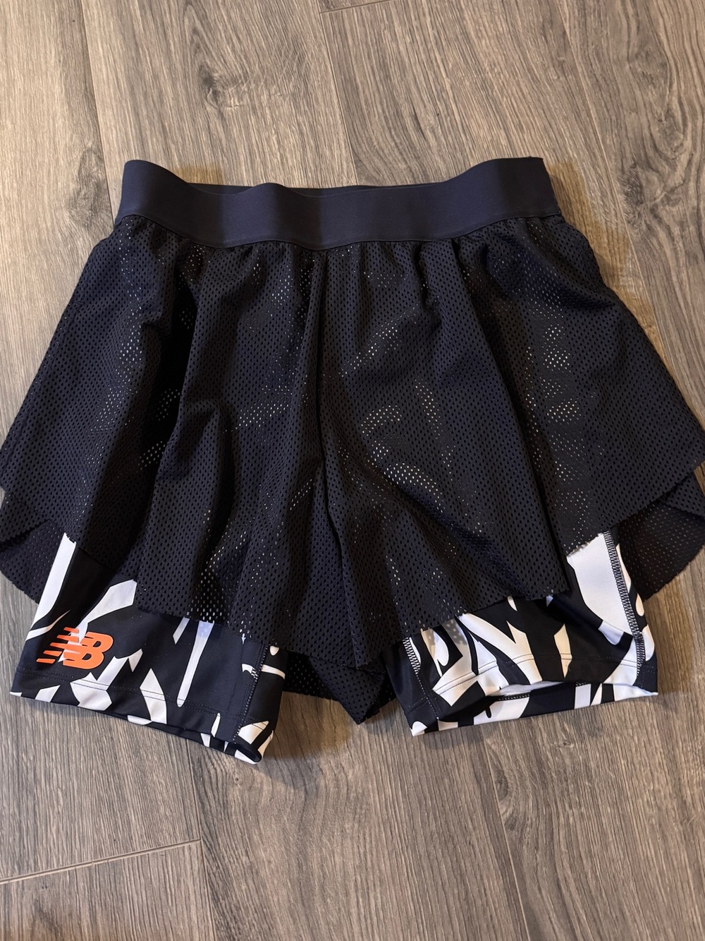 New Balance black and white tournament mesh shorts size M